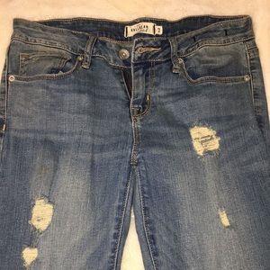 Light wash ripped skinny jeans